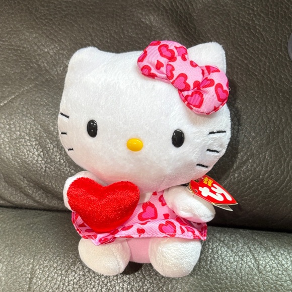Hello Kitty Other - Hello kitty ty beanie baby kitty in heart leopard dress holding heart